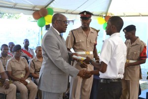 Mr. Robinson - CSJP - presents certificate of achievement    to a partic...