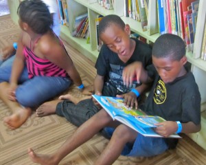 Children at the Trench Town Reading Centre learning together.