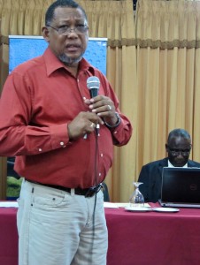 Intrepid Jamaican climate change negotiator and head of the Climate Branch at the Jamaica Meteorological Service Clifford Mahlung. In the background is Albert Daley, Principal Director of the Climate Change Division, who also gave an honest and forthright assessment of Jamaica's climate change priorities.
