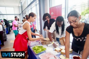 Miss Jamaica World Kaci Fennell donned an apron to help the Global Shapers.
