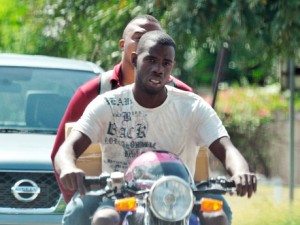 Motorbike riders in Jamaica habitually do not wear helmets.