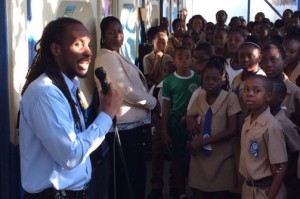 Chevening Scholar and Member of Parliament Alando Terrelonge talking to students at Naggo Head Primary School in St. Catherine last year.